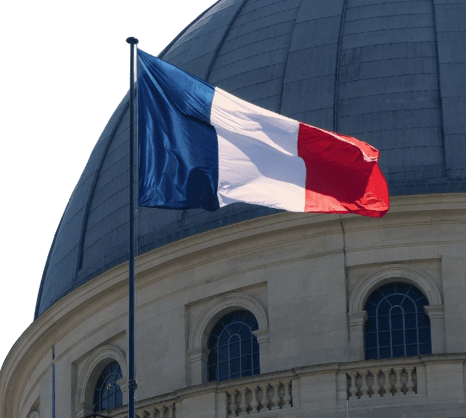 France Flag In Front of Building